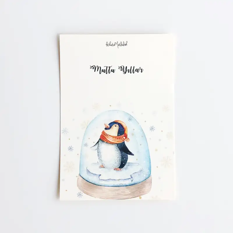 Kar küreli penguen mutlu yıllar motto kartı / kartpostal